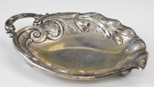 German 800 grade silver leaf dish raised on three ball feet, length 18cm, weight 102g