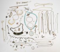 A collection of silver jewellery including four bangles, necklace set with labradorite, eight