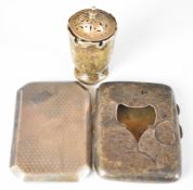 Two hallmarked silver cigarette cases and an Art Nouveau hallmarked silver pepper, height 6.5cm,
