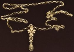 A 9ct gold Welsh love spoon pendant (5cm) on 9ct gold chain, 5.2g, 74cm