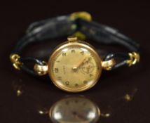 Cyma 9ct gold ladies wristwatch with subsidiary seconds dial, gold hands and Arabic numerals, silver