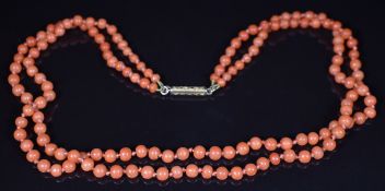 Double strand of coral beads with 9ct barrel clasp, 15.3g, 38cm