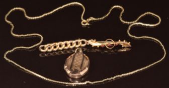 A 9ct gold chain, two 9ct gold brooches (6.5g) and a 9ct gold back and front locket