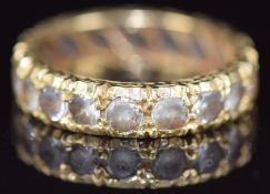 A 12ct gold eternity ring set with spinel, 3.6g, size I