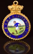 A 9ct gold fob/ medallion set with enamel depicting a gentleman playing football, 9.3g, 2.3cm