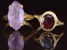Two 9ct gold rings, one set with an amethyst the other a garnet, 6.6g, sizes Q & S