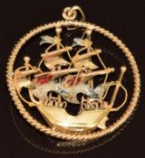A yellow metal bi-coloured pendant in the form of a Portuguese carrack, with enamel decoration,