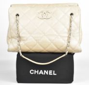 Chanel Hampton large handbag in pale beige leather with signature Chanel logo to the front and
