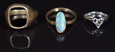 A 9ct gold ring set with a black opal (damaged), 9ct gold ring mount and another 9ct gold ring