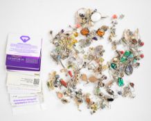 One hundred and ten pairs of silver earrings including pressed amber, zircon, tourmaline, topaz,