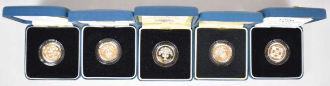 Five Royal Mint silver proof £1 coins, cased, most with certificates