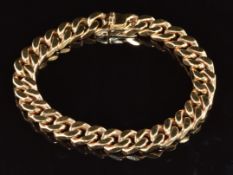 A 9ct gold curb link bracelet, 50.8g, 20cm