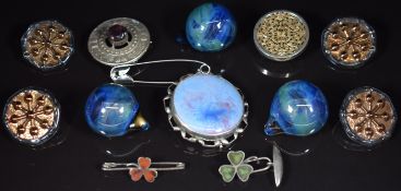 Four matching glass buttons and three matching ceramic buttons with Bimini marked backs, Ruskin