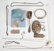 A collection of silver jewellery including two ingots, ring set with marcasite, pendant, bangle in