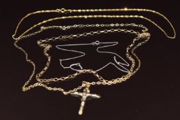 Three 9ct gold chains, a 9ct white gold chain and a 9ct gold crucifix, 5.2g