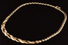 A 9ct gold necklace made up of smooth and brushed links. in original Crouch jewellers box, 15.7g