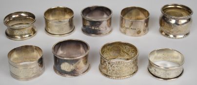 Nine various hallmarked silver napkin rings including a pair, weight 194g