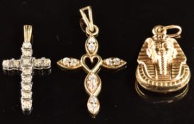 Two 9ct gold cross pendants, one set with diamonds and one with cubic zirconia, and a 9ct gold