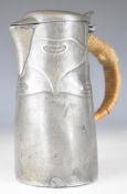 Archibald Knox for Liberty & Co. Arts and Crafts or Art Nouveau pewter jug, marked to base English