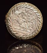 A 9ct gold ring set with a plaque of St George, 6.9g, size Y