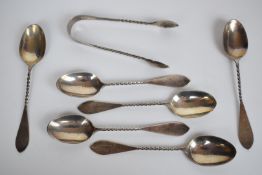 Set of Victorian hallmarked silver teaspoons and sugar tongs with twisted handles, London 1889,