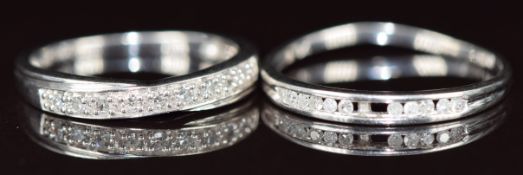 Two 9k white gold half eternity rings set with diamonds (one with two diamonds missing), 2.7g, sizes