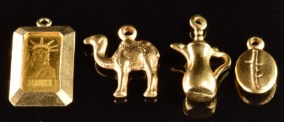 Credit Suisse 1g of fine gold in a 14k gold pendant (1.7g), and three 9ct gold charms in the form of