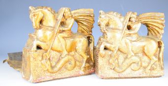 Two gilt carved wood bookends formed as George and the Dragon, length of horse 17.5cm