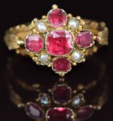 Victorian 12ct gold ring set with foiled paste and seed pearls, with foliate shoulders and