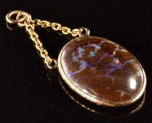 A 9ct gold pendant set with an opal boulder, 2.5g, 3 x 1.4cm