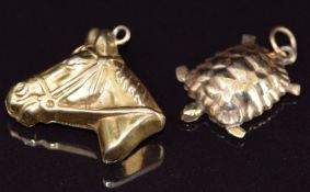 Two 9ct gold charms in the form of a horse's head and a turtle, 2.6g