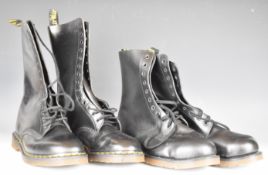Two pairs of vintage black Dr Martens Air Wair boots comprising ten and fourteen hole examples,