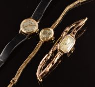 Three 9ct gold ladies wristwatches comprising Garrard on black leather strap and in original box,