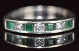 A 9ct white gold half eternity ring set with emeralds and princess cut diamonds, 2.7g, size N