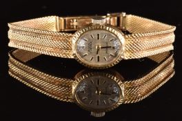 Avia 9ct gold ladies wristwatch with black hands, two-tone baton hour markers, silver dial and 17