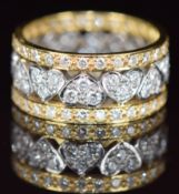 A bespoke 18ct bi-coloured gold eternity ring with heart decoration set with diamonds, with original