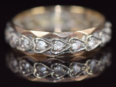 A 9ct gold eternity ring set with quartz in a heart design, 2.9g, size N