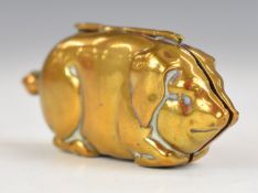 Novelty brass or bronze sovereign case to house both half and full sovereign coins, length 7cm