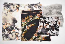 Louis Vuitton black silk scarf with floral decoration and signature logo throughout,130 x 1 30cm,