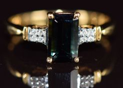An 18k gold ring set with an octagonal cut Itatiaia tourmaline of approximately 1.3ct and diamonds