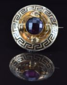 A 9ct gold mourning brooch set with enamel, verso glass compartment set with hair, 16.4g, 3.8cm