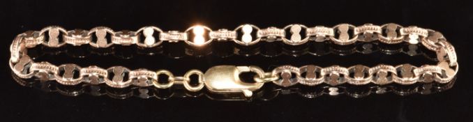 A 9ct rose gold bracelet made up of oval ridged links, 6.3g, 19cm