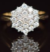 A 9ct gold ring set with a cluster of diamonds, the total diamond weight approximately 1ct, size O