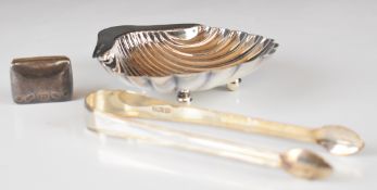 Hallmarked silver shell shaped dish raised on three ball feet, Sheffield 1911, maker Atkin Brothers,