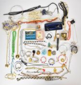 A collection of jewellery including coral necklace, Art Deco 9ct gold necklace (3.3g), silver chain,