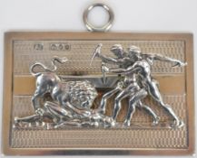 Victorian hallmarked silver letter clip with scene of a man being mauled by a lion, London 1892,