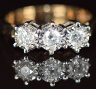 A 9ct gold ring set with three diamonds, each approximately 0.16ct, 3.9g, size N