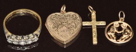 An 18ct gold ring set with five diamonds in a platinum setting (2.9g, size O), 9ct gold heart locket