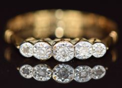 An 18ct gold ring set with five graduated diamonds in a platinum setting, 1.9g, size O
