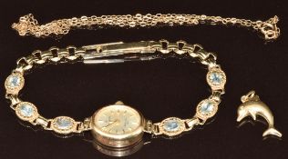 A 9ct gold watch set with topaz, 9ct gold chain and 9ct gold dolphin pendant, 12.1g